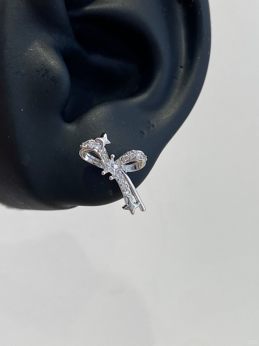 Gleam Bow Helix Earrings