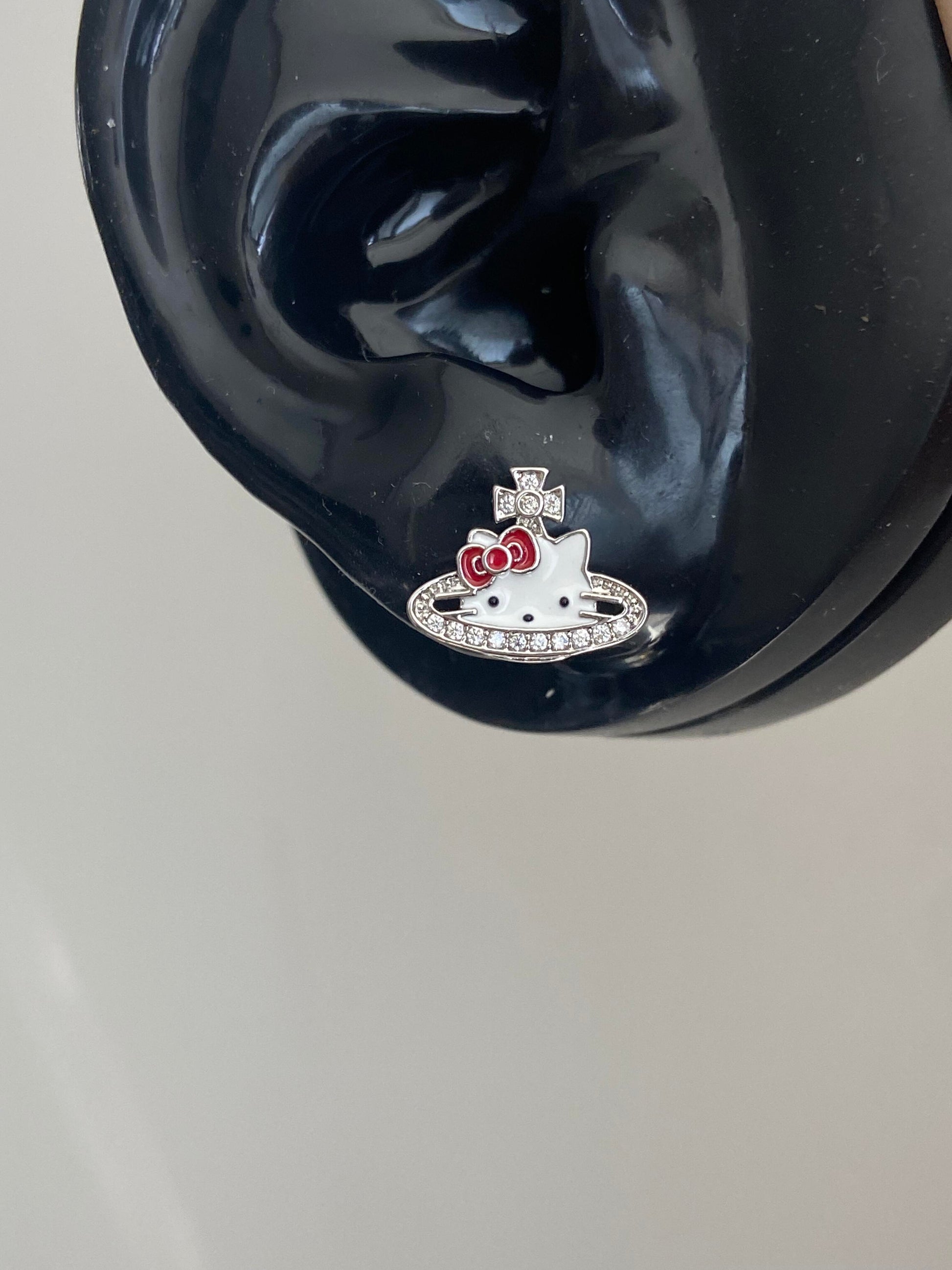 Kitty Saturn Emblem Helix Earrings