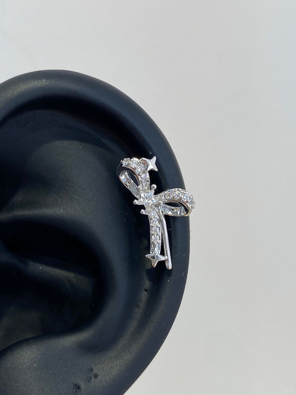 Gleam Bow Helix Earrings