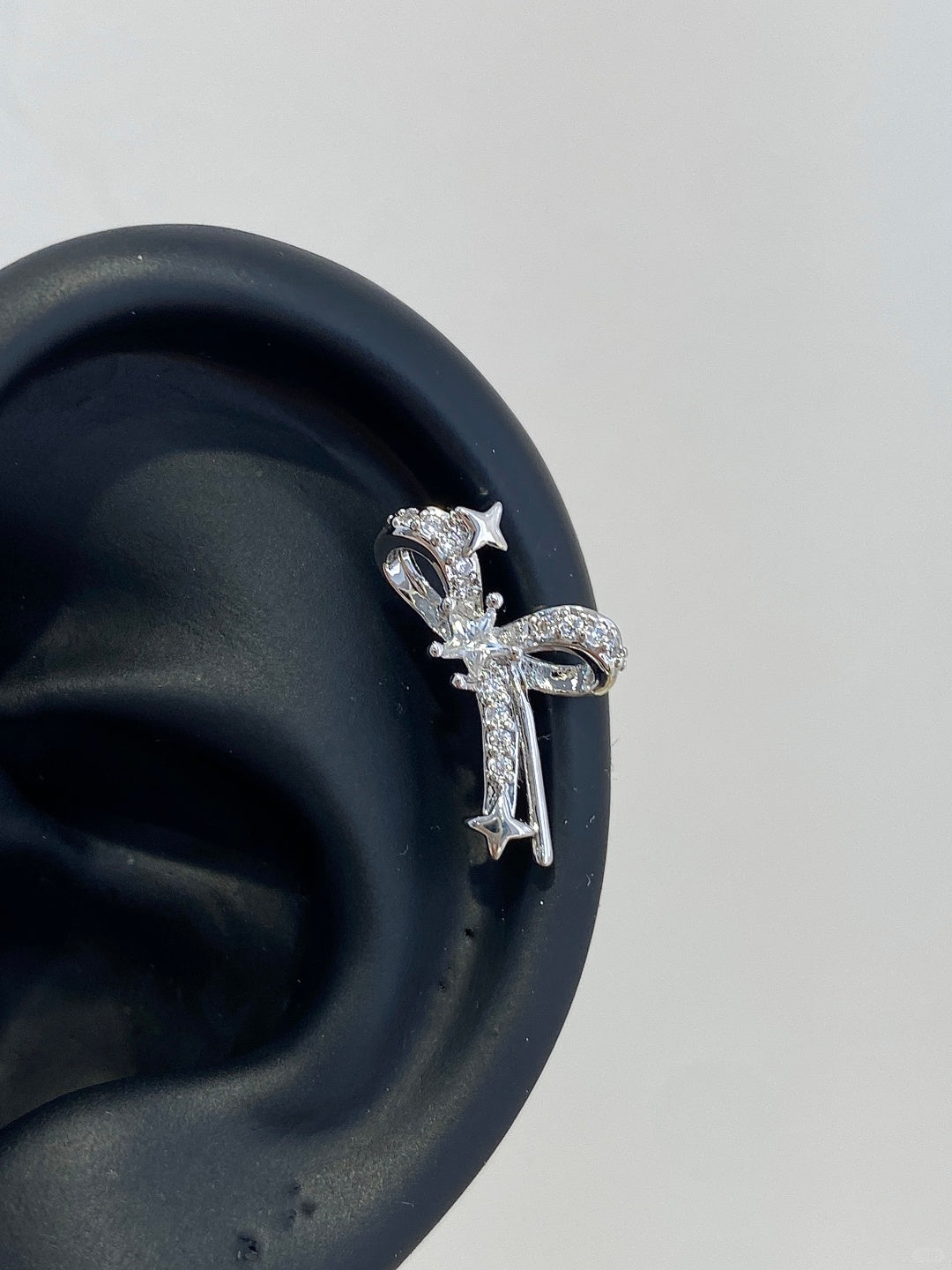 Gleam Bow Helix Earrings