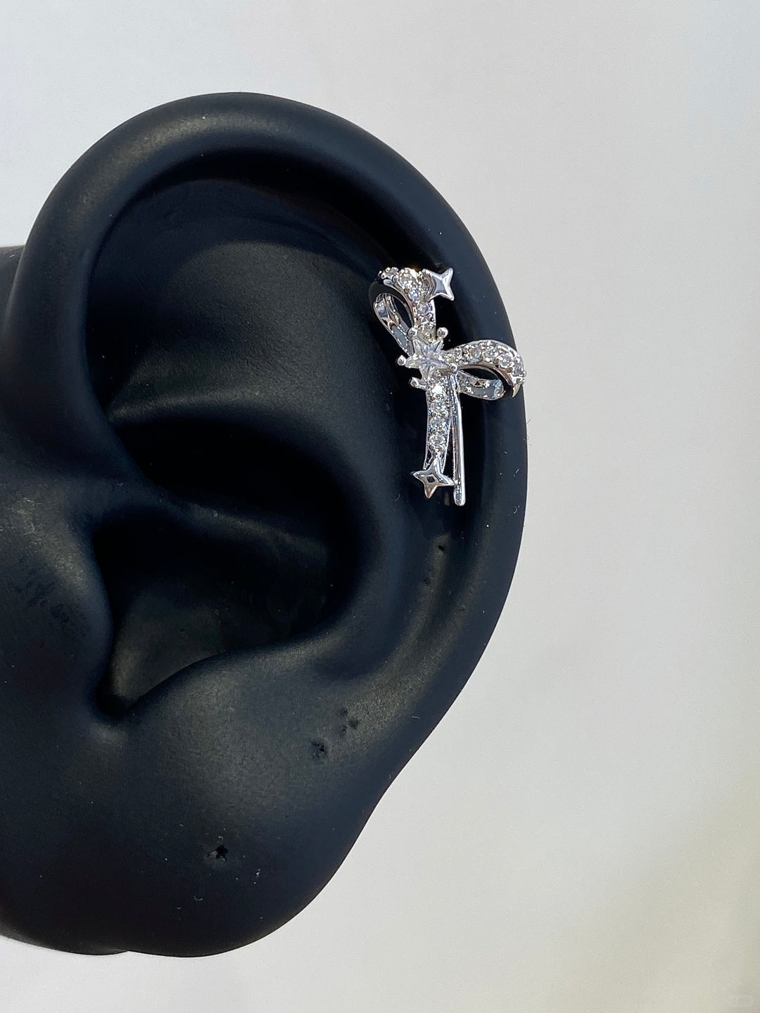 Gleam Bow Helix Earrings